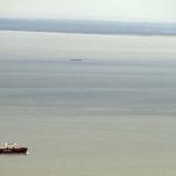 A barge travels across the Long Island Sound