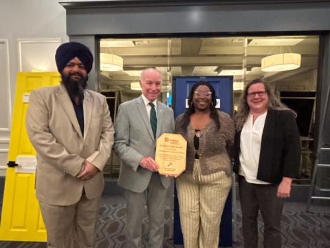 Rep. Courtney stands with Norwich Mayor Swarnjit Singh, homeowner Leslie Souvenance, and Executive Director of Habitat for Humanity of Eastern CT Sarah Lufler.