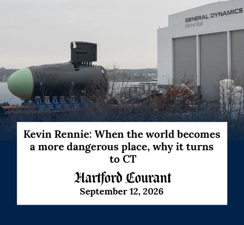 An image of a Columbia-class submarine module at the Electric Boat shipyard in Groton, Connecticut with a Hartford Courant headline overlayed.
