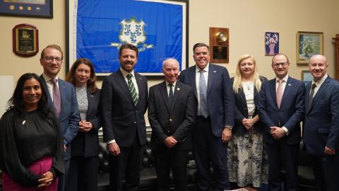 Rep. Joe Courtney stands with the Australian Parliament delegation to the U.S. and Australian Ambassador Moriarty.