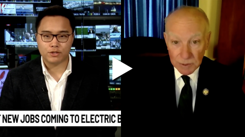 An image of News 8 reporter Mike Cerulli and Rep. Joe Courtney with a play button overlayed.