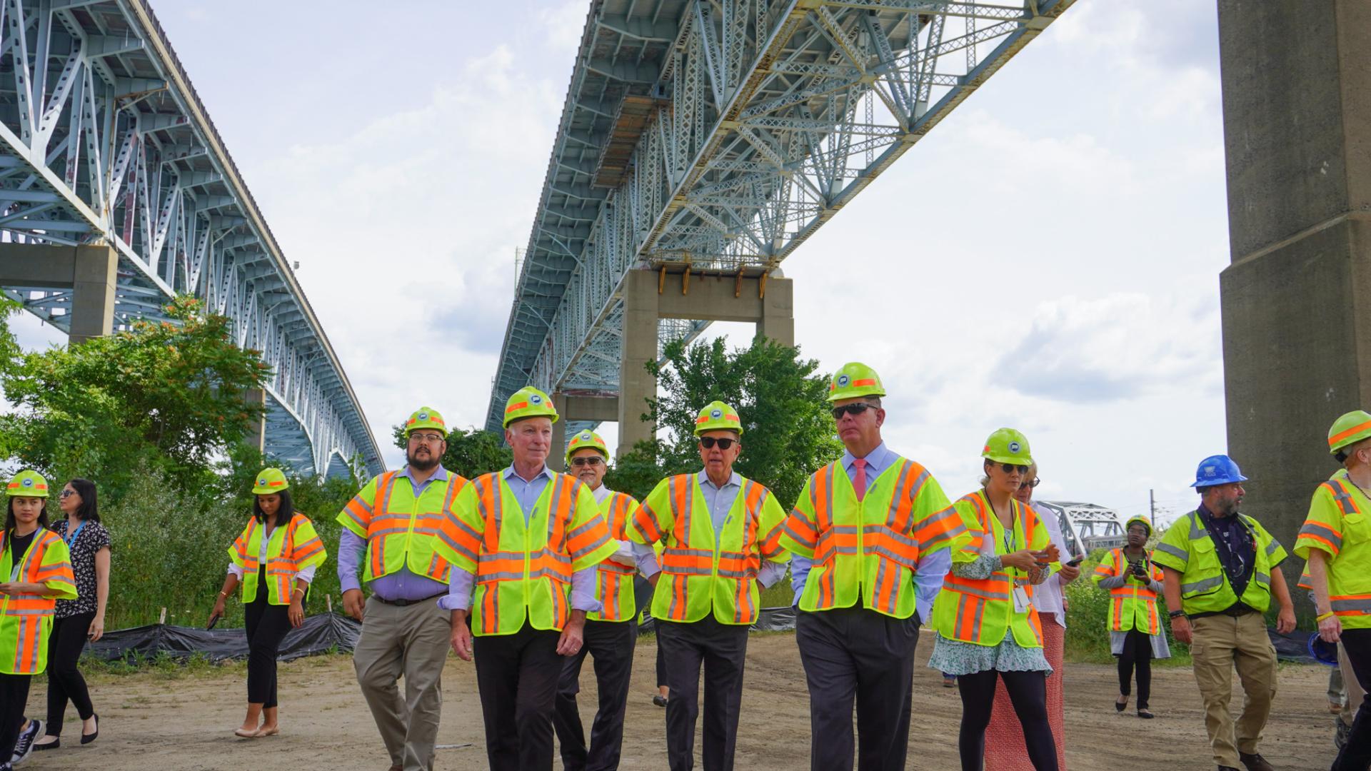 Congressman Courtney and Former U.S. Secretary of Labor Marty Walsh walk underneath of the Gold Star Bridge