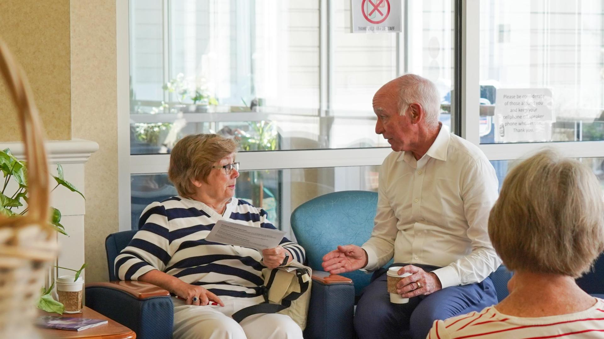 Congressman Courtney speaks with a constituent.